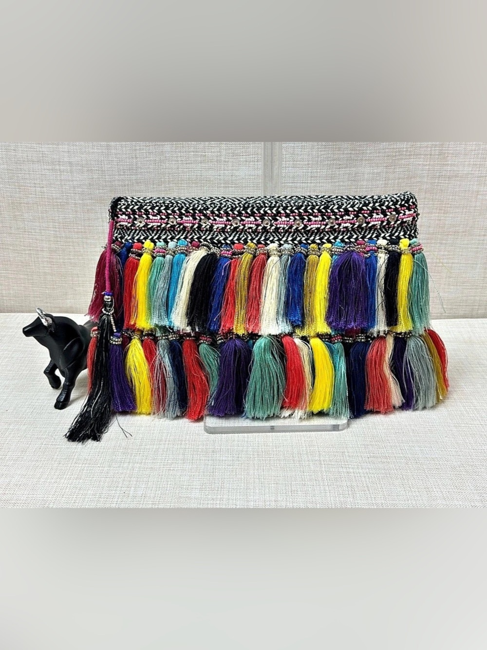 Christophe Sauvat Tassel-Embellished Woven Clutch.